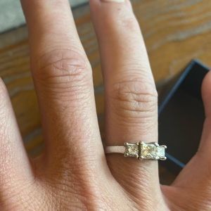 Engagement ring Princess cut platinum setting.